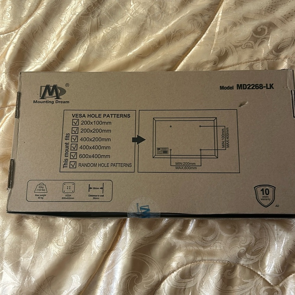 Tilting TV Wall Mount. New In Box. Box still sealed.